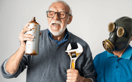 Alternative Lubricants That Will Make Your Grandpa Proud: Elderly man holding wrench and spray can with person in gas mask