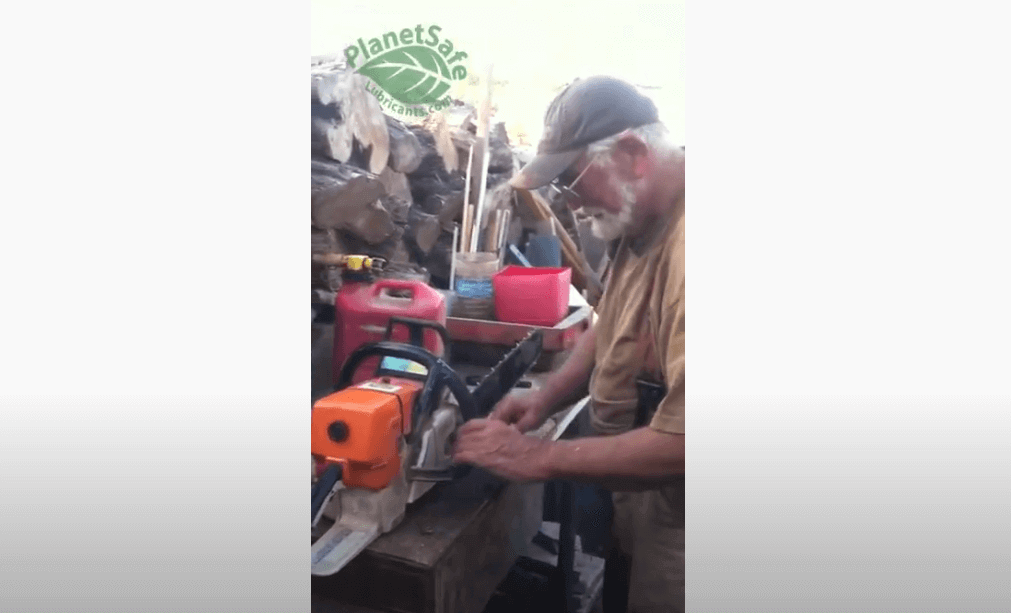 John Addleman using the Best Chainsaw Lube - Sunrise Firewood Chainsaw and PlanetSafe AIM Lubricant in Imperial Beach, CA.