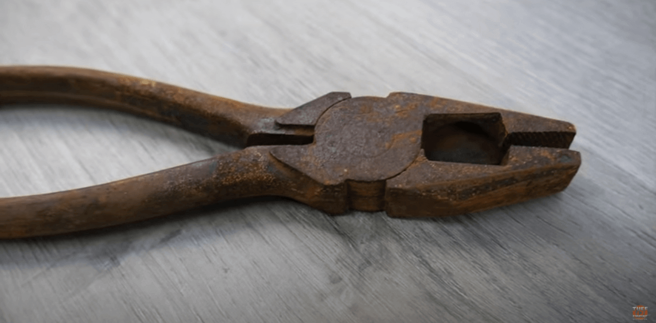 How to Fix Badly Rusted Pliers - Image of rusted lineman pliers before restoration.
