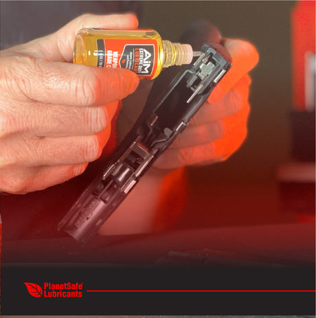 Using AiM Weapons Grade CLP (1oz + sprayer applicator) for firearms cleaning and corrosion prevention, eco-friendly lubricant.